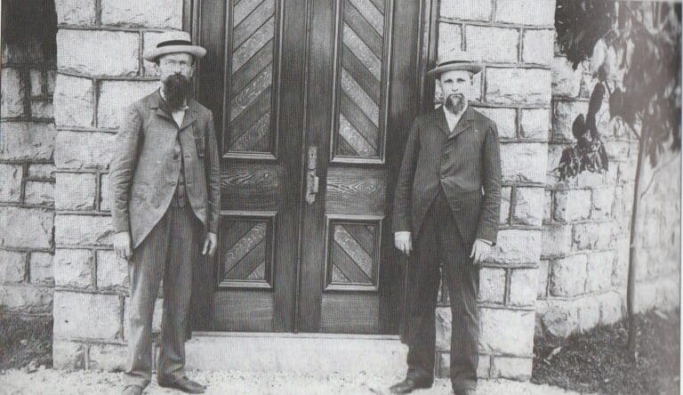 Joseph Janson, right, and Peter Bitner in front of the Holy Trinity Cemetery Chapel, circa 1895